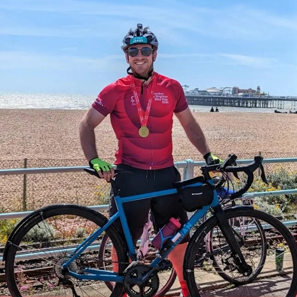 Me with my bike and medal after the London to Brighton bike ride.